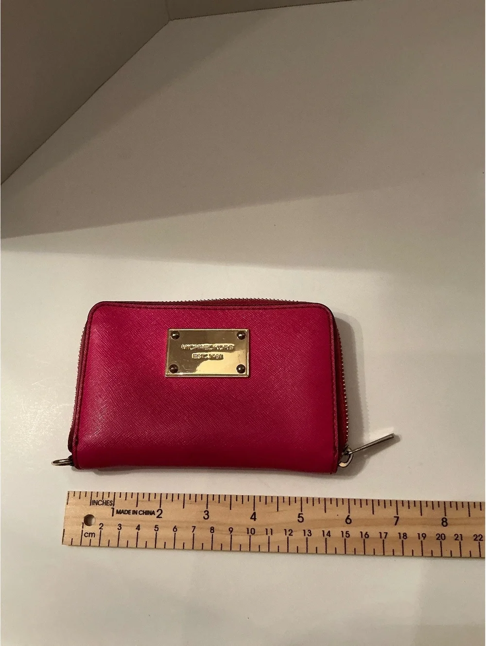Michael Kors Pink leather zip-around wallet with logo and card slots